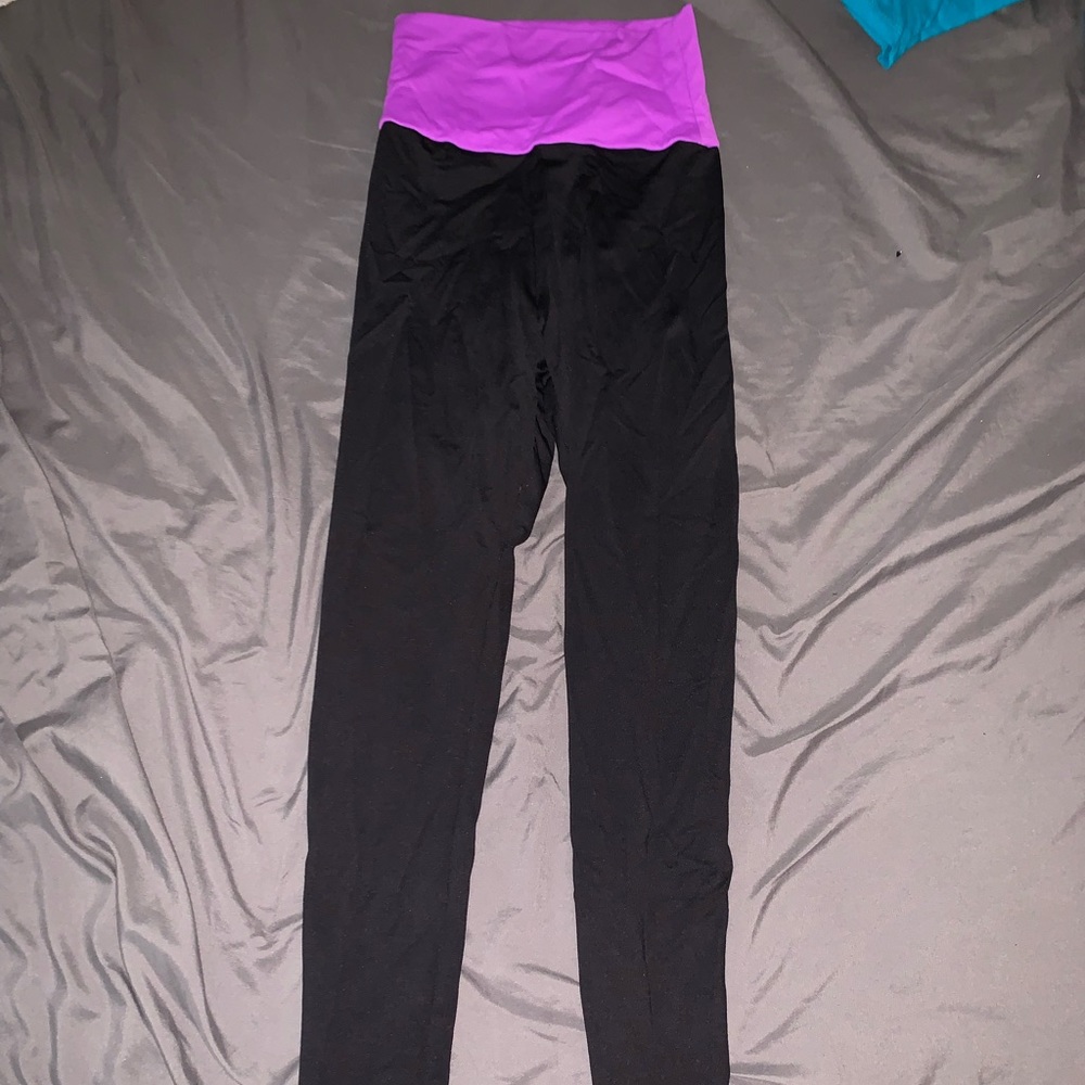 black leggings with purple waistband